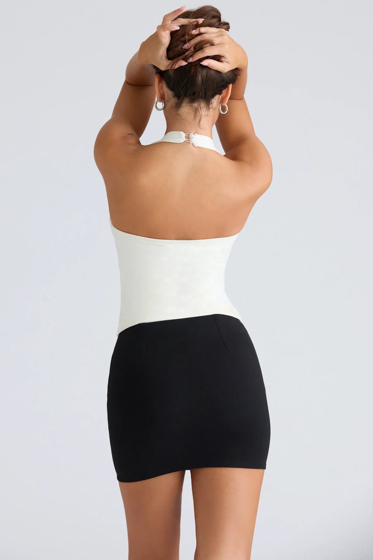 The Peekaboo Ivory Halter Neck Corset Top